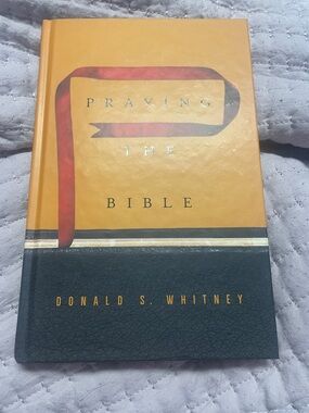 Praying the Bible by Donald S. Whitney - Orange & Black Cover